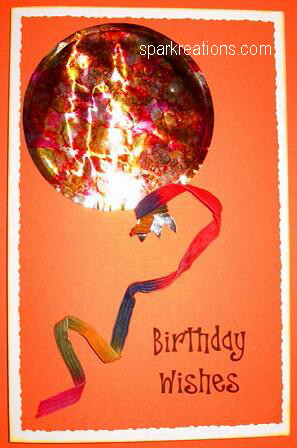 5 1/2" x 8 1/2" card; fibers: $12 card...alcohol inks on foil balloon...3