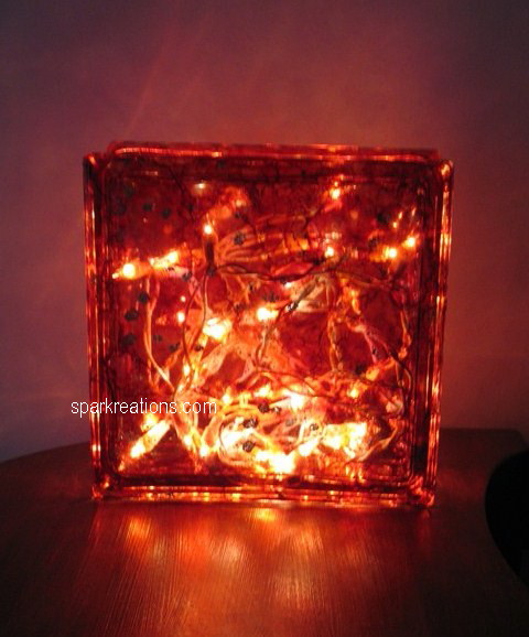 light box (on display)...(cranberry, chili pepper, tangerine, ginger, gold mixative)...1